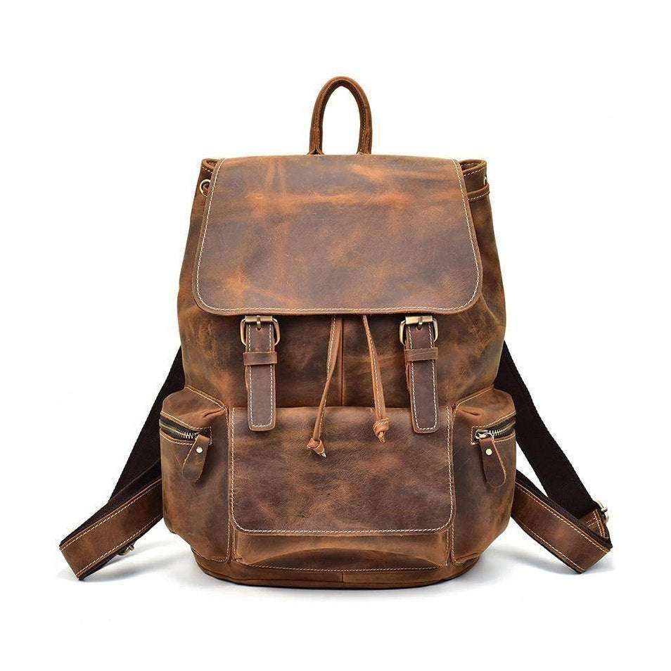 Brown leather retro school backpack for students with adjustable straps and multiple pockets