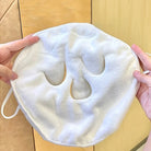 White reusable hot and cold face mask for soothing relief