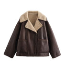 Stylish reversible fur leather jacket in brown with a cozy collar and spacious pockets