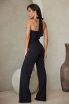 Women’s rhinestone halter neck jumpsuit in black with a stylish back tie for elegant summer outings