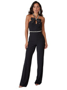 Elegant black rhinestone halter neck jumpsuit with bow detail and stylish wide legs