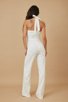 Elegant women's rhinestone halter neck jumpsuit with a stylish back for a chic summer look
