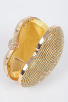 Rhinestone heart shape clutch with gold detailing and yellow satin interior for elegant evening wear