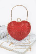 Red rhinestone heart shape clutch with a gold chain and top handle for stylish occasions