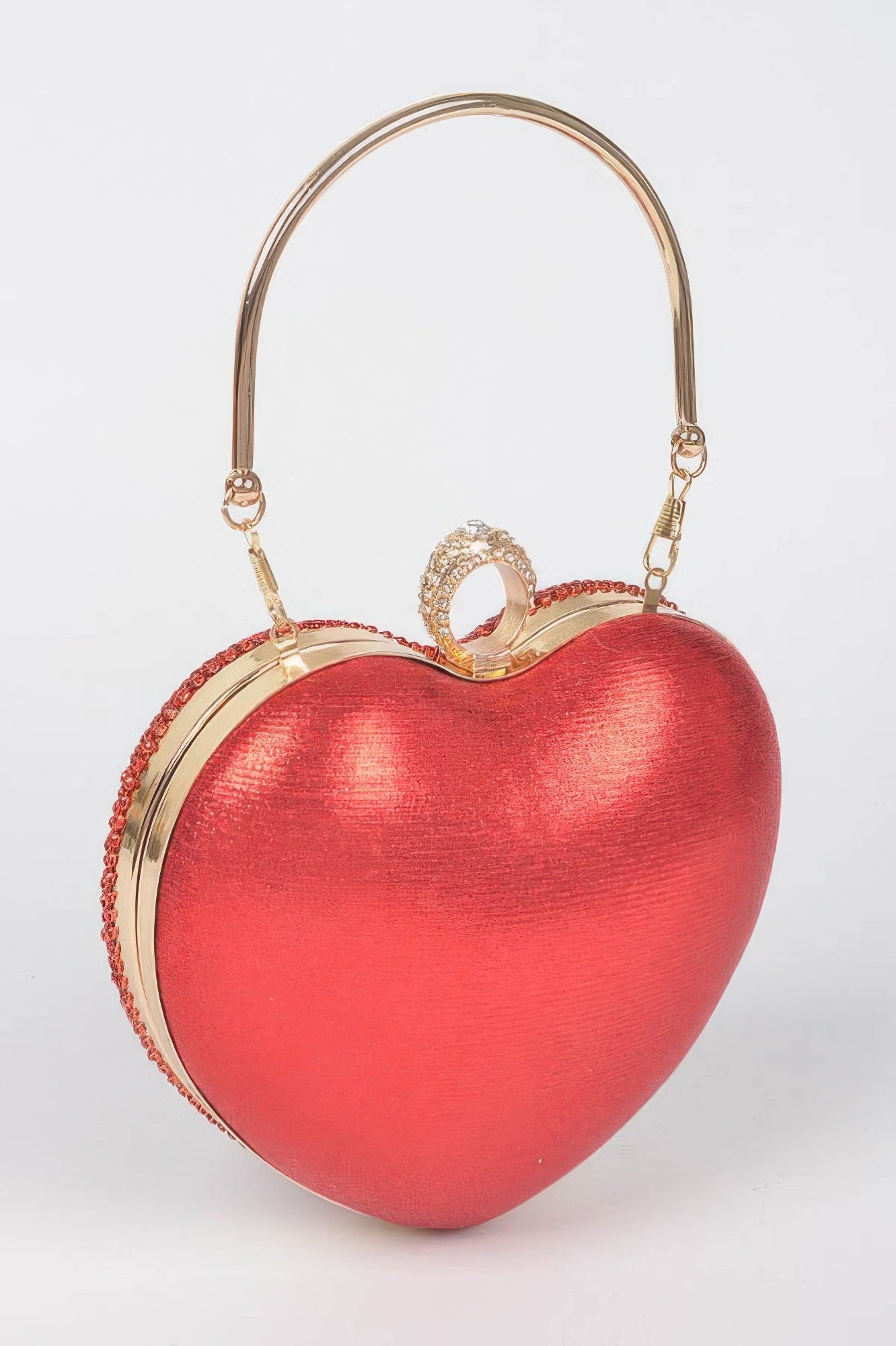 Red rhinestone heart shape clutch with a gold handle perfect for special occasions
