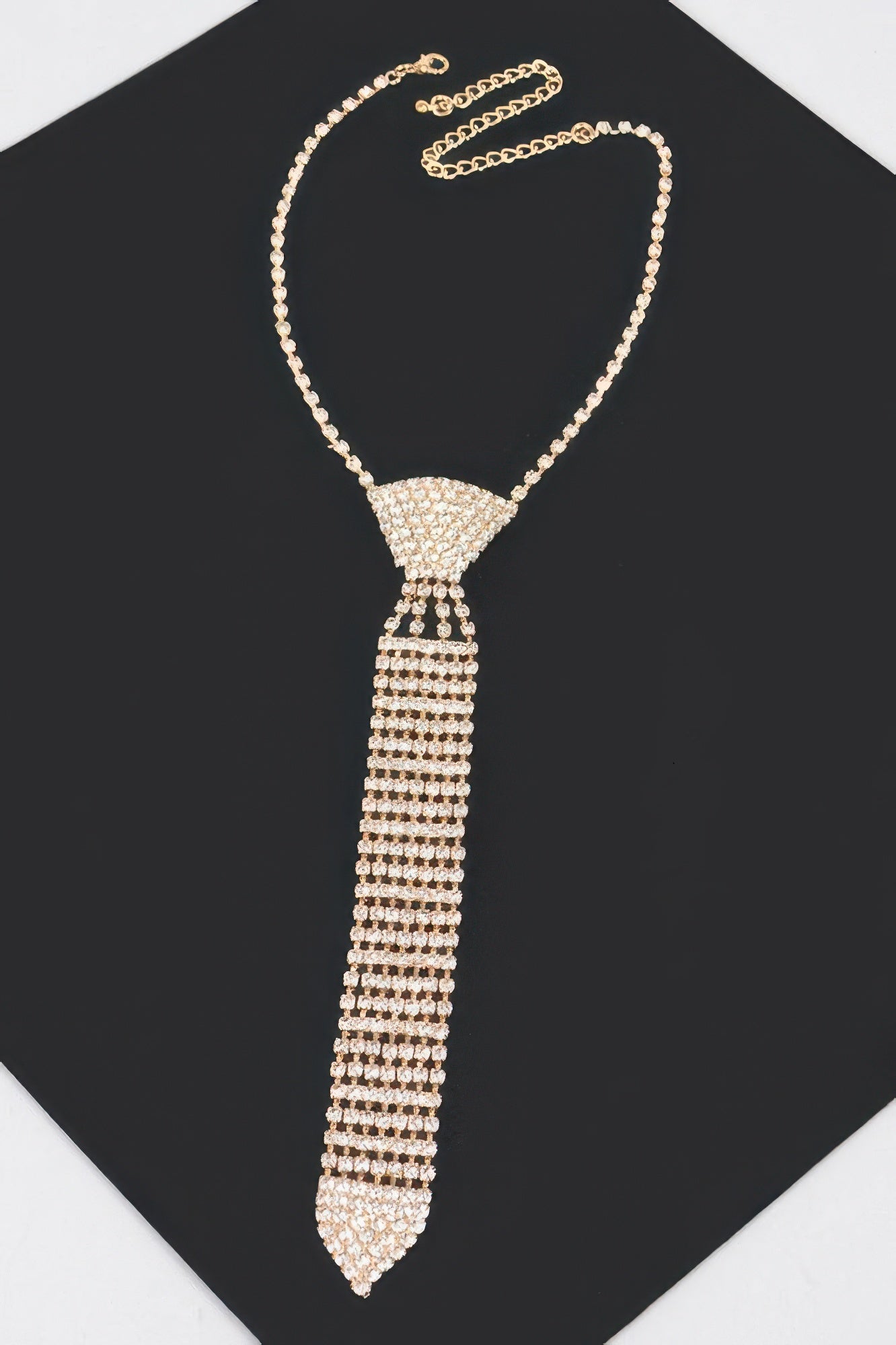 Gold rhinestone necktie necklace with intricate detailing for a stylish look