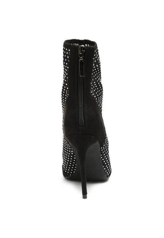 Stylish black rhinestone stiletto boots with a sleek zipper design for women's fashion