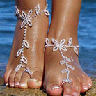 Elegant rhinestone toe ring jewelry featuring floral designs, perfect for summer beach outings