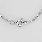 Close-up of a rhodium brass necklace featuring a secure toggle clasp design