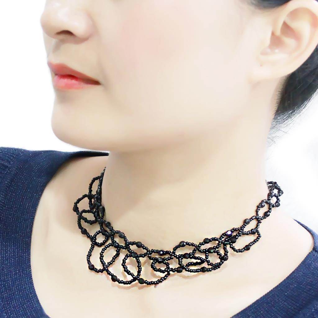 Stylish rhodium brass synthetic necklace featuring intricate loop designs for modern fashion