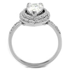 Stunning rhodium plated silver engagement ring with a sparkling center stone and intricate detailing