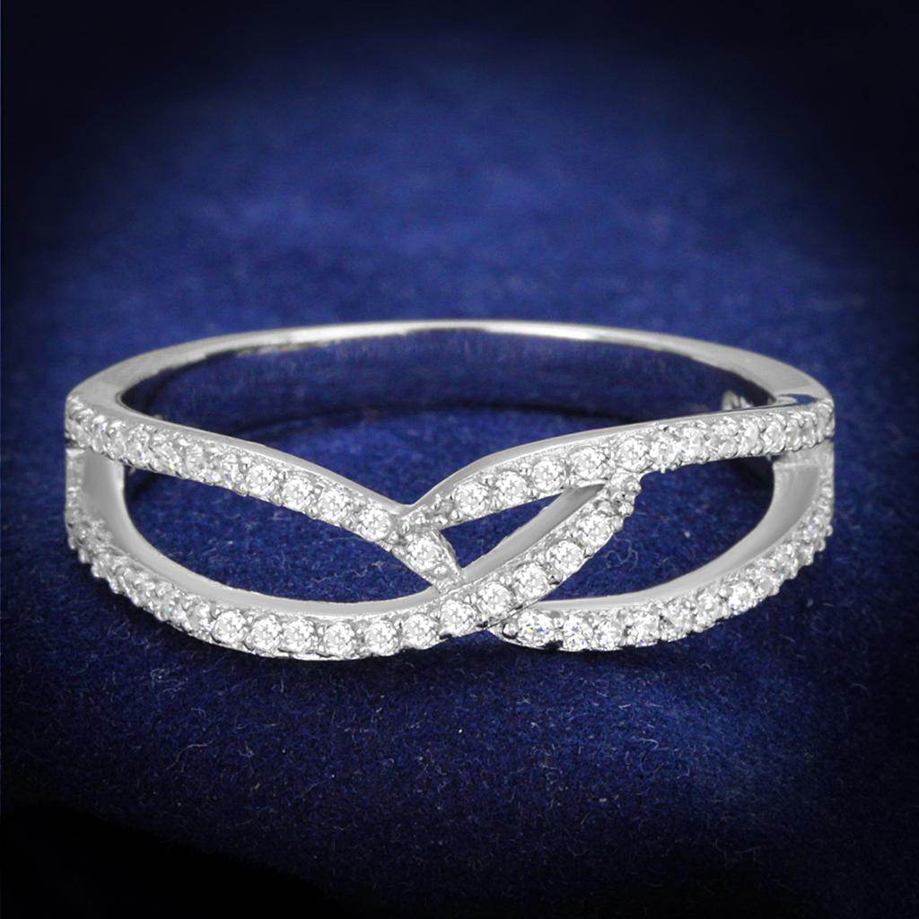 Elegant rhodium plated silver ring for women featuring intricate crossover design and sparkling gemstones
