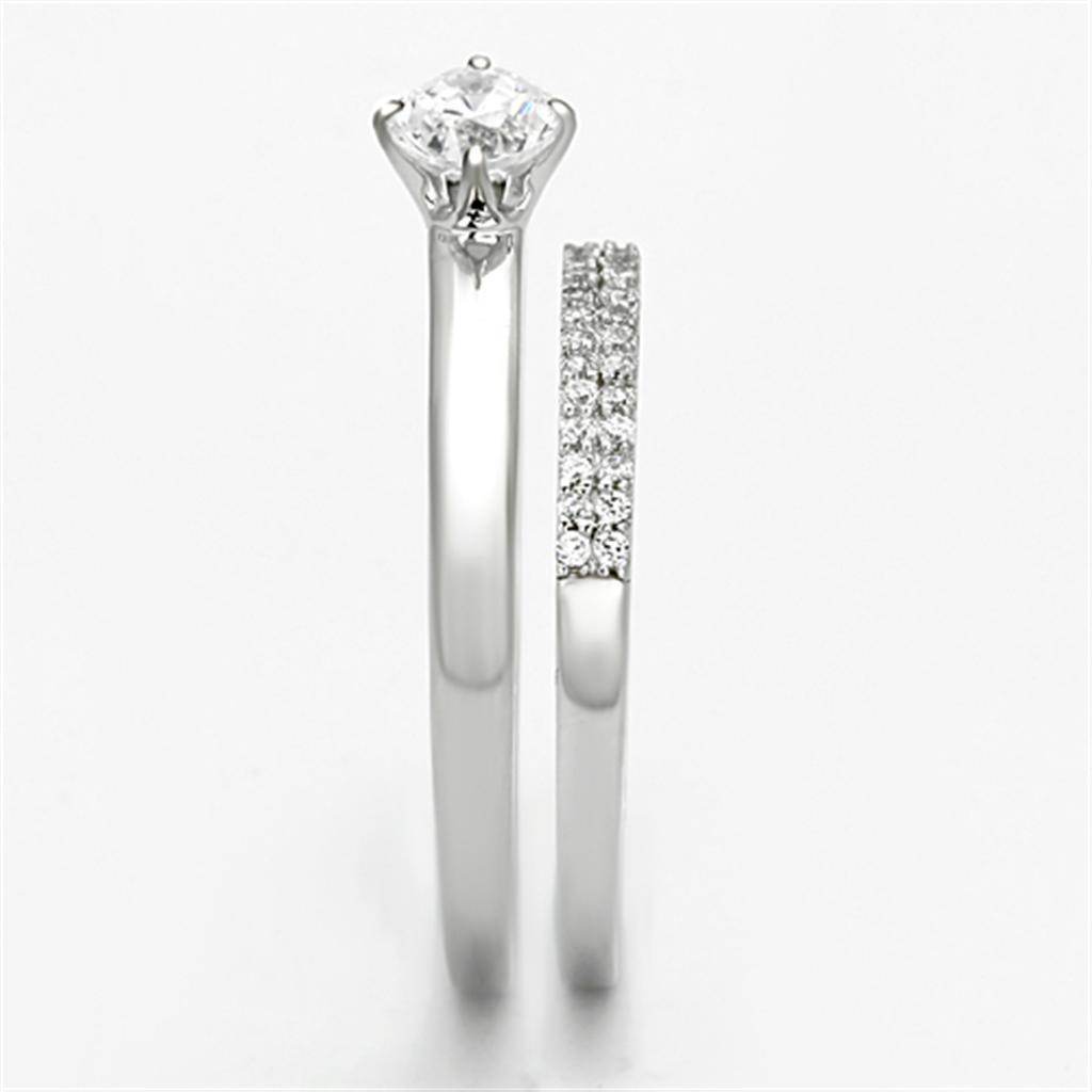 Elegant rhodium plated sterling silver ring with a sparkling center stone and pave band detailing