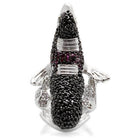 Unique rhodium ruthenium brass ring designed as a fish with sparkling details and artistic flair