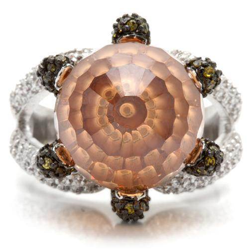 Stunning rhodium statement cocktail ring with a large pink gemstone set in intricate design