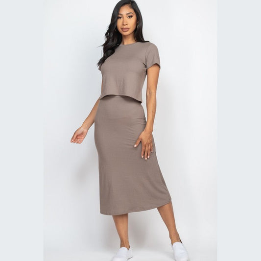 Capella ribbed midi skirt set in taupe worn by woman with short sleeve top and midi skirt