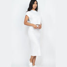 Capella white ribbed midi skirt set featuring a fitted high-waist skirt and short-sleeve crop top