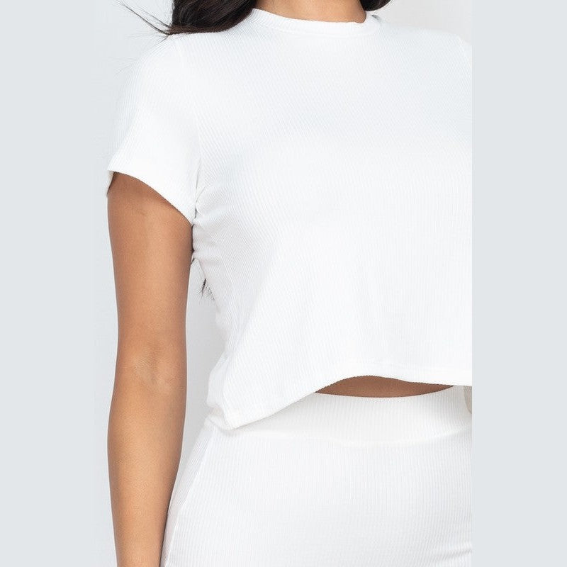Capella white ribbed midi skirt set featuring a cropped short sleeve top and high-waisted skirt