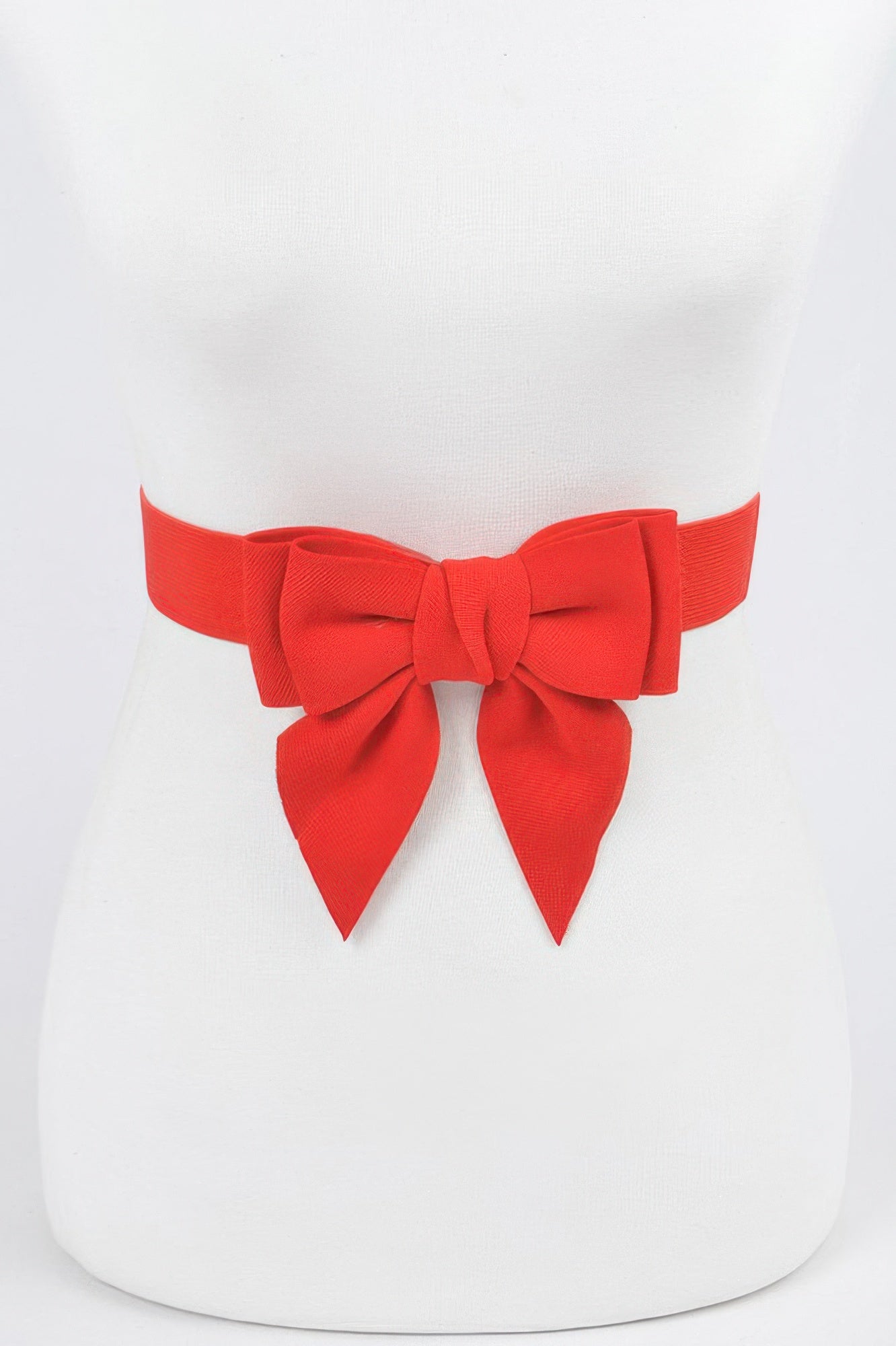 Red ribbon buckle stretch belt featuring a large bow for stylish women's accessory