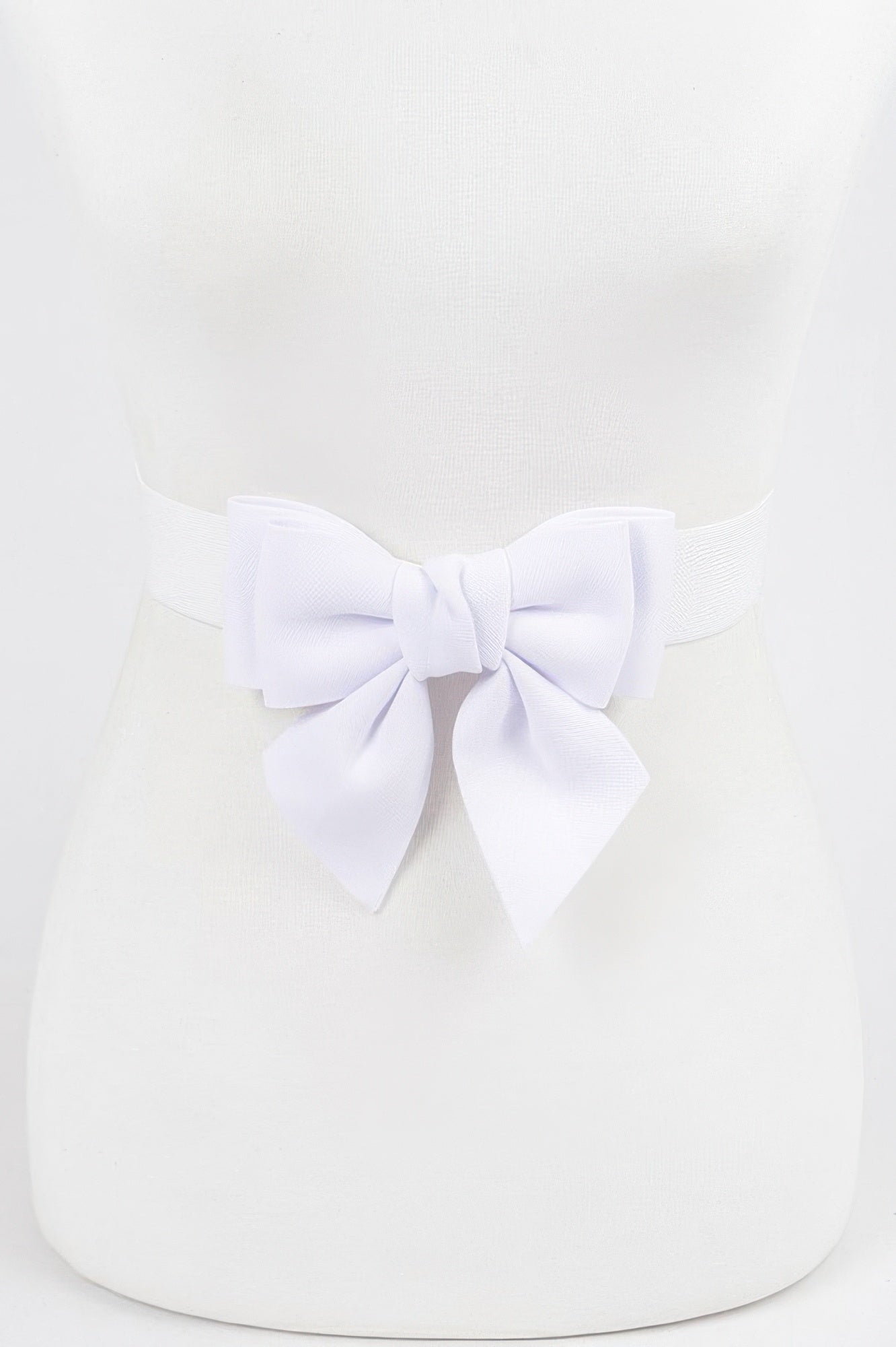 White ribbon buckle stretch belt with a large bow for a stylish and feminine accessory