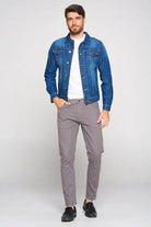 Men's Blue Age rich blue jean jacket styled with a white shirt and grey pants