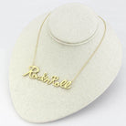 Rock and roll gold necklace featuring a cursive design for stylish music lovers