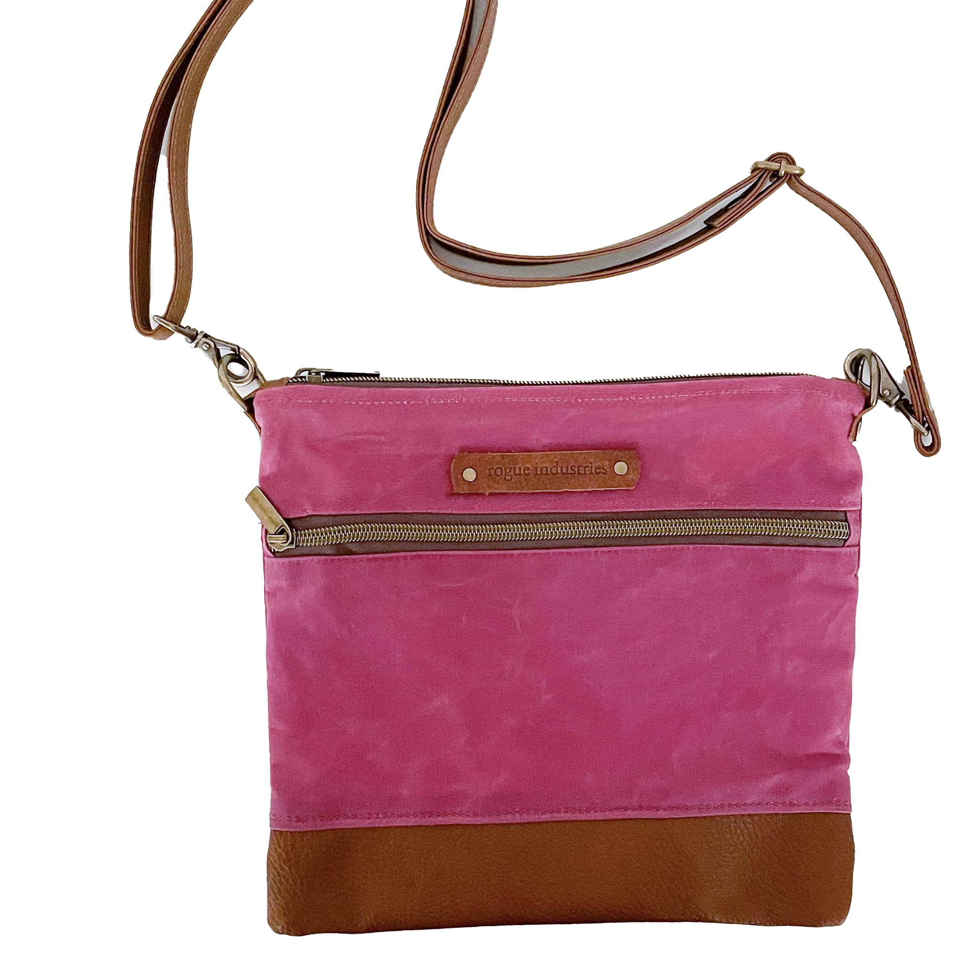 Rogue Industries stylish messenger bag for vacations in pink with brown accents and adjustable strap