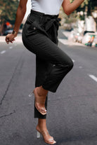 Women's ruffle belt skinny pants in olive green with stylish cargo pockets for a trendy look