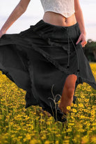 Stylish black ruffle drawstring waist skirt perfect for summer outings and casual wear