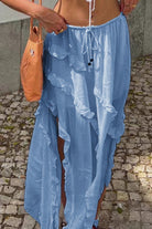 Light blue ruffle drawstring waist skirt from VacationGrabs with flowing design and side slits
