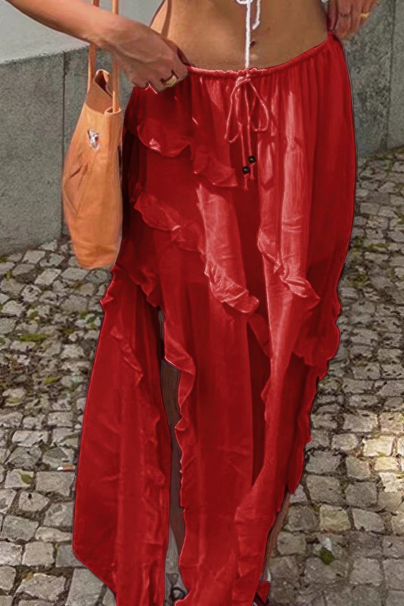 Red ruffle drawstring waist skirt with a flowy design, perfect for summer outings