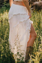 VacationGrabs ruffle drawstring waist skirt in flowing white fabric with ruffle detailing