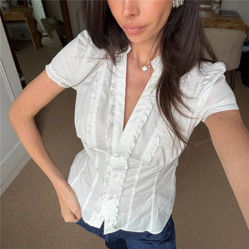Women's white ruffle frill blouse, perfect for casual outings