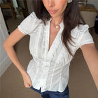 Women's white ruffle frill blouse, perfect for casual outings