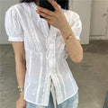 Women's white ruffle frill blouse perfect for casual outings