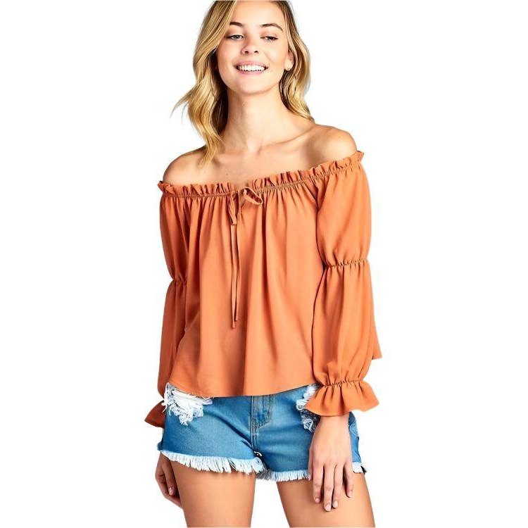 Ivory Felix ruffled front tie long sleeve blouse in rust color perfect for casual outings