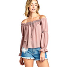 Ivory Felix ruffled front tie long sleeve blouse in soft pink, perfect for casual spring outfits