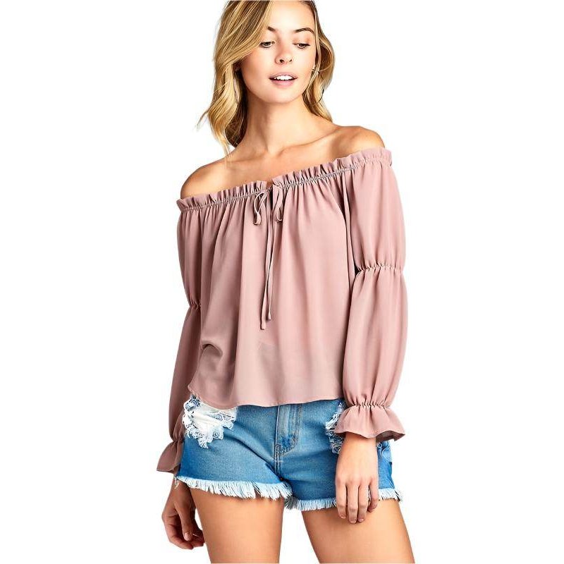 Ivory Felix ruffled front tie long sleeve blouse in soft pink, perfect for casual spring outfits