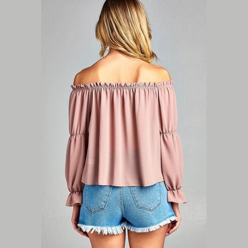 Ivory Felix ruffled front tie long sleeve blouse in soft pink with off-shoulder design and gathered sleeves