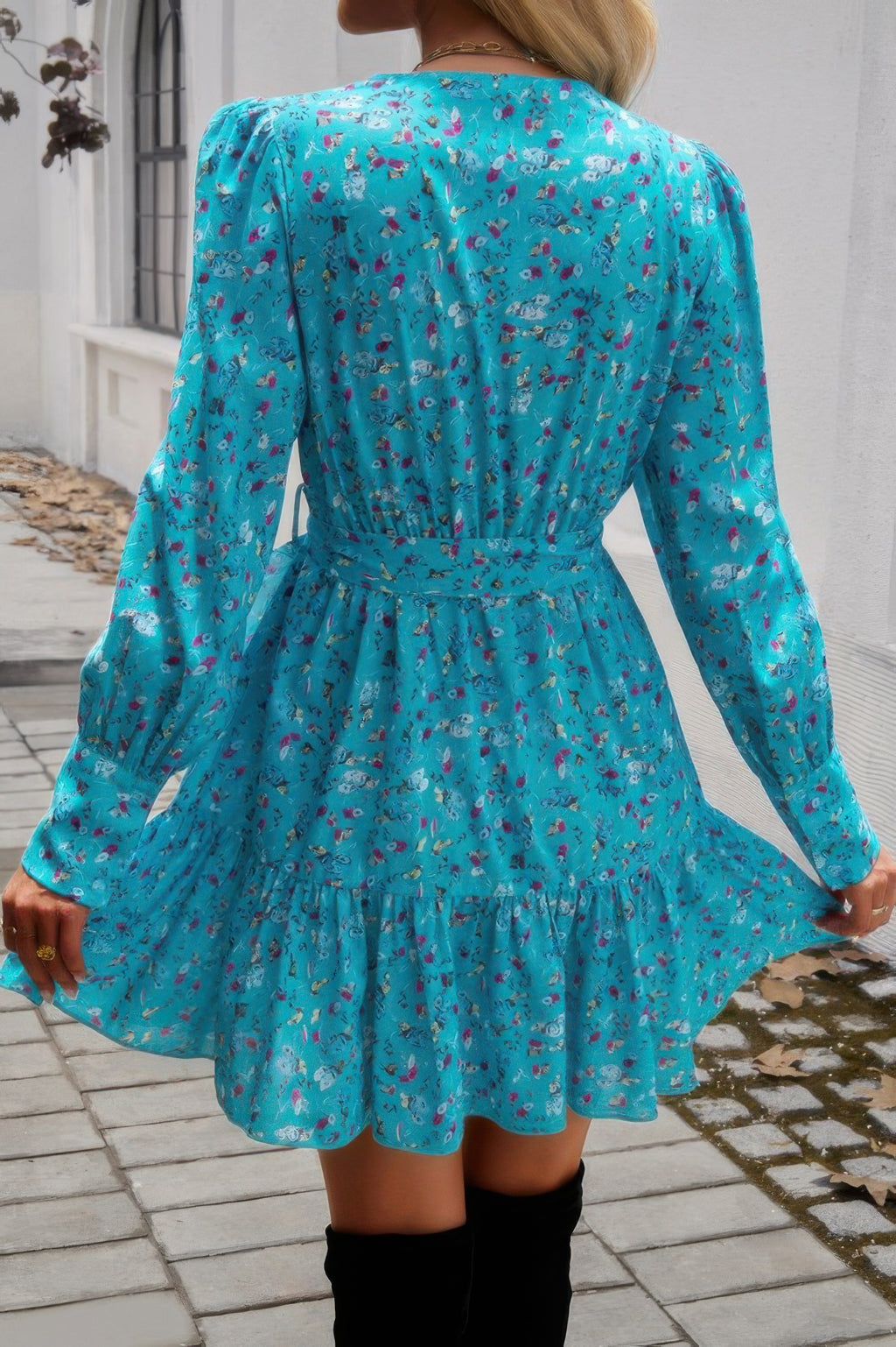 VacationGrabs ruffled surplice mini dress in blue floral print with long sleeves and a flared hem