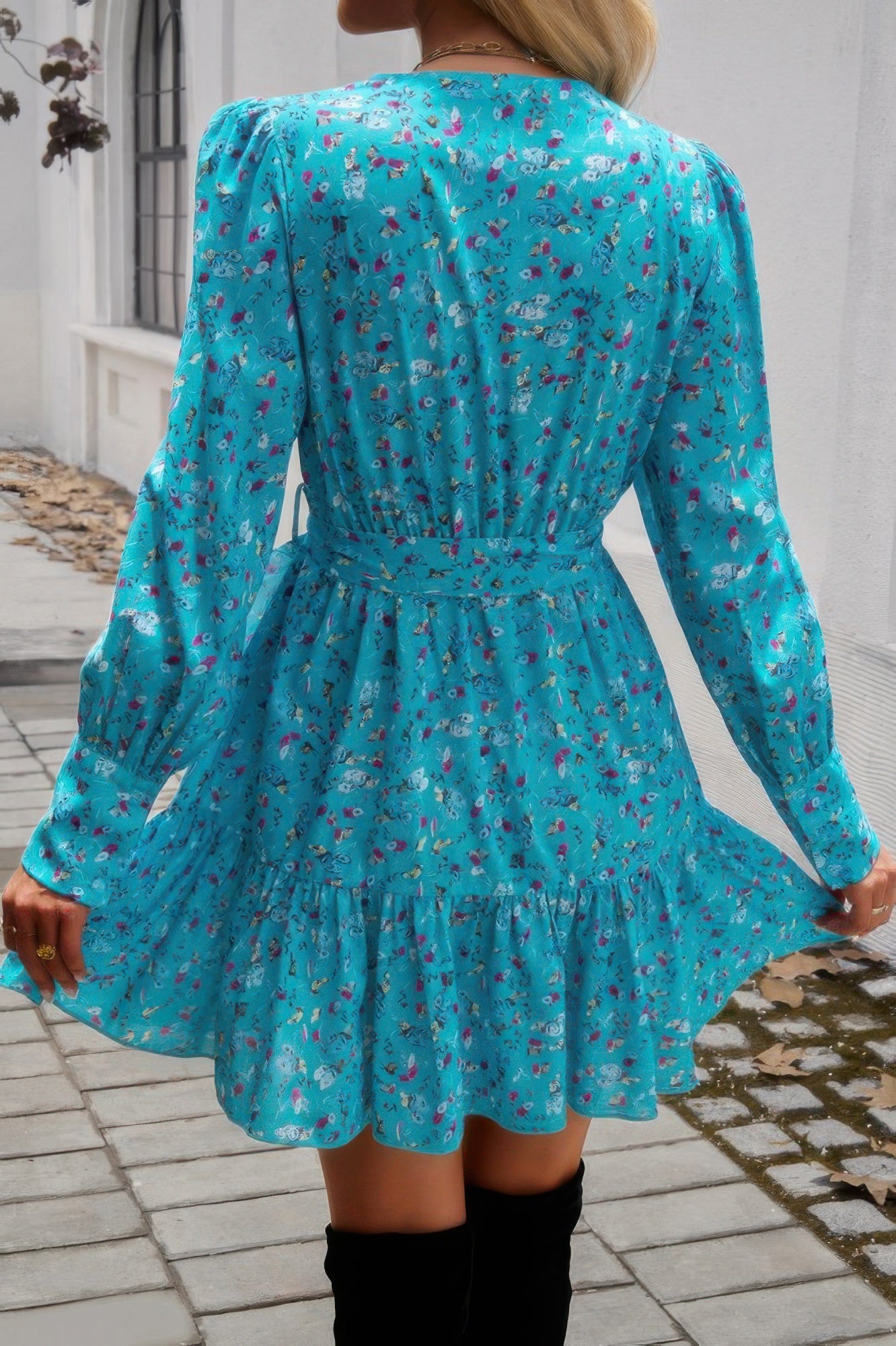 VacationGrabs ruffled surplice mini dress in blue floral print with long sleeves and a flared hem