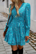 VacationGrabs ruffled surplice mini dress in teal with floral print and tie waist