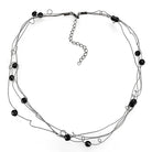 Elegant ruthenium white metal necklace with multiple strands and black bead accents for a chic look