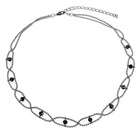 Elegant ruthenium white metal necklace featuring delicate links and black bead accents
