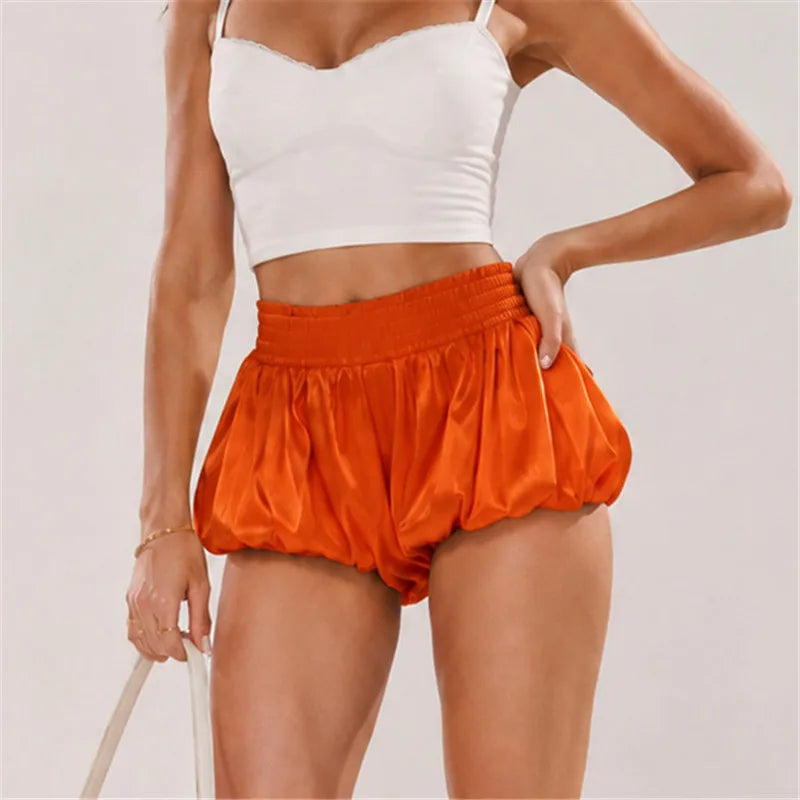 Orange satin and lace shorts for stylish summer outings