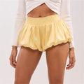 Yellow satin and lace shorts for trendy summer outfits