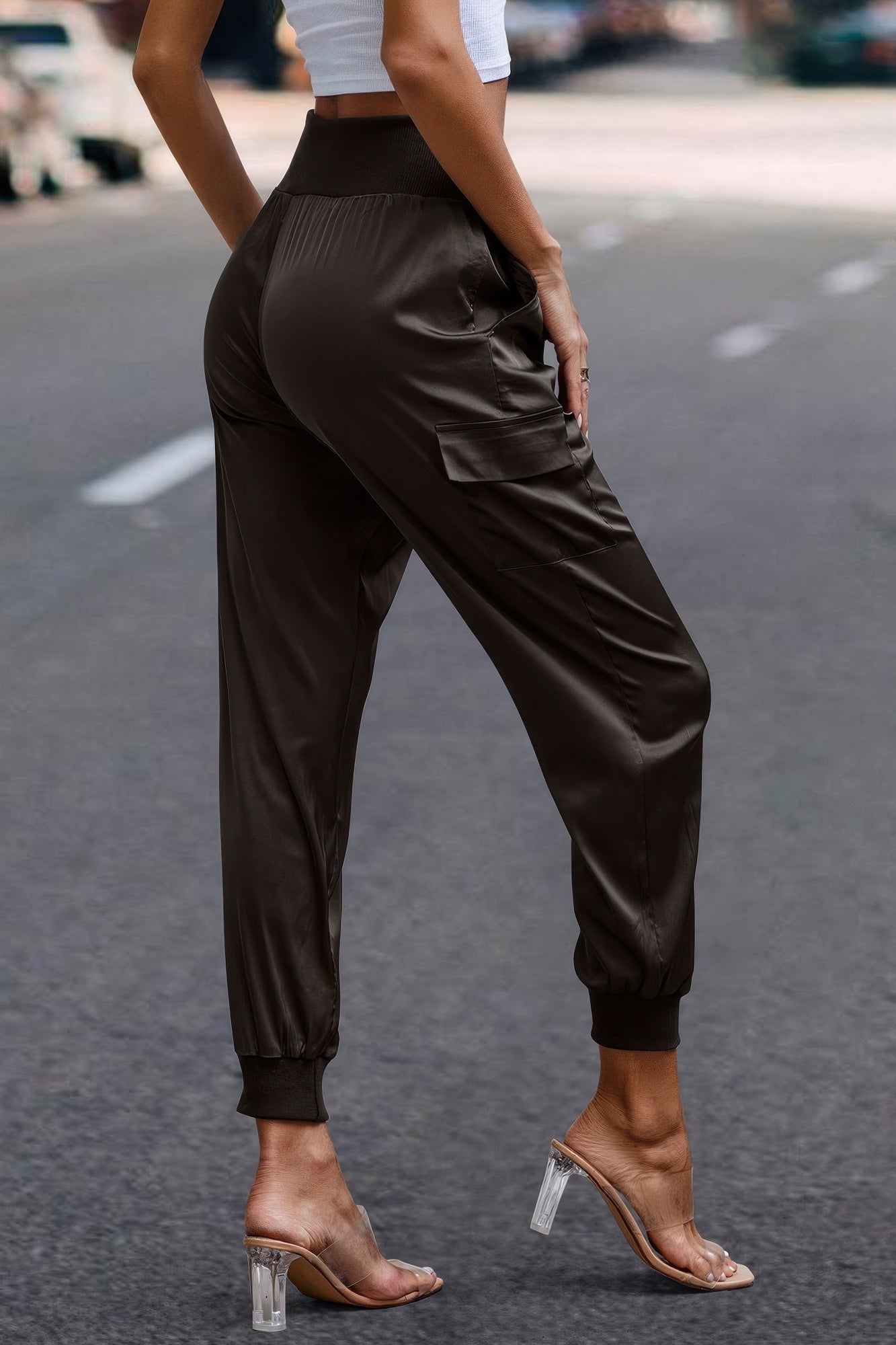 Women's satin cargo joggers in black with elastic waist and cuffed ankles by VacationGrabs