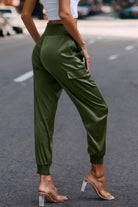 Women's olive green satin cargo joggers with elastic waistband and side pockets by VacationGrabs