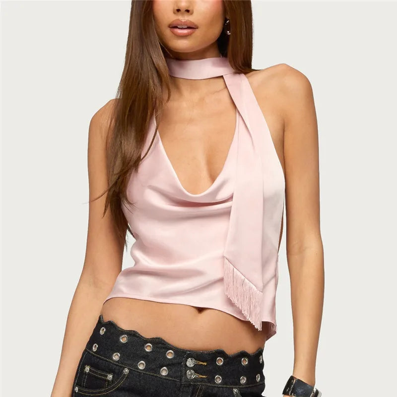 Women's pink satin halter top with fringe detail, perfect for nights out