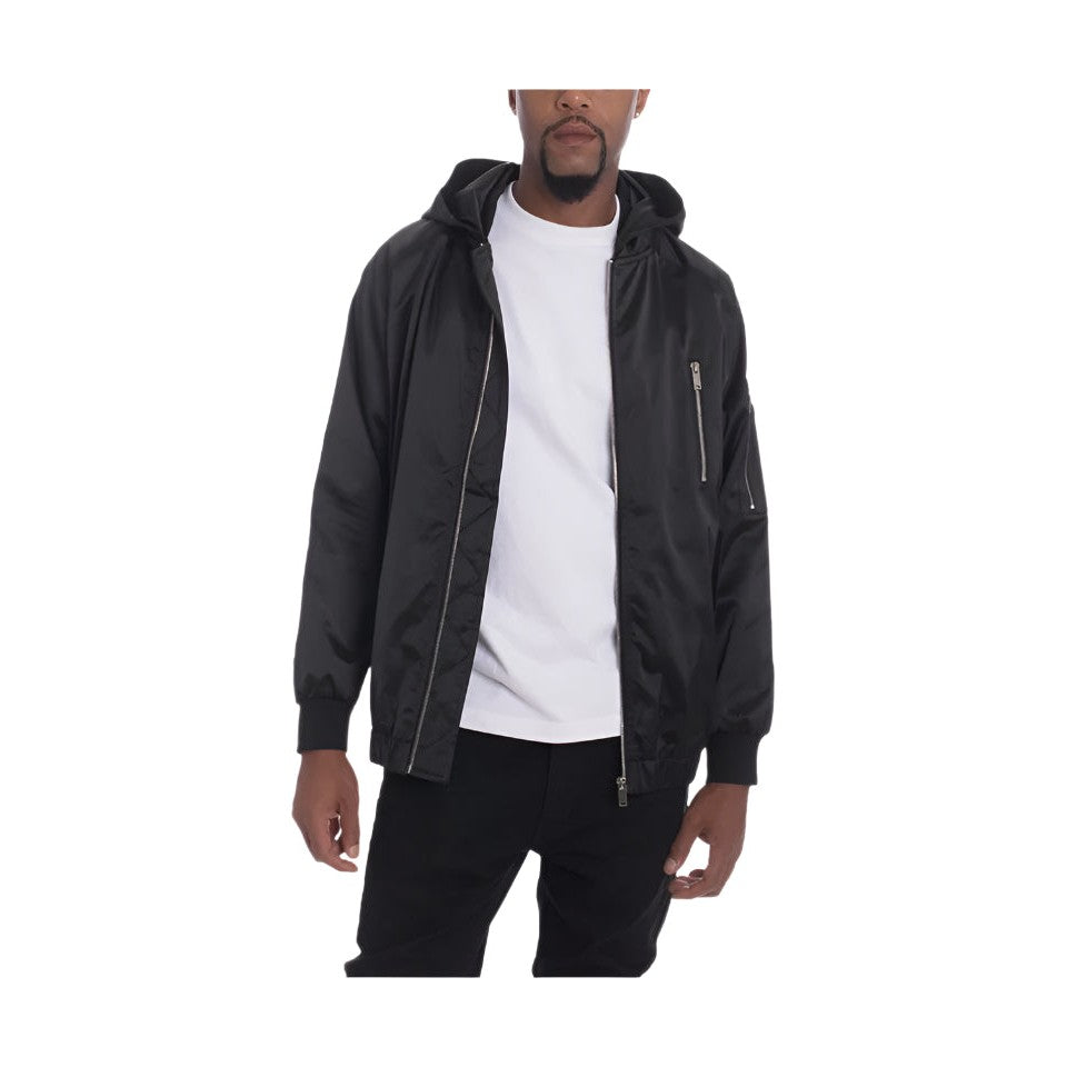 WEIV satin hooded windbreaker jacket in black worn over white t-shirt with zippered pockets